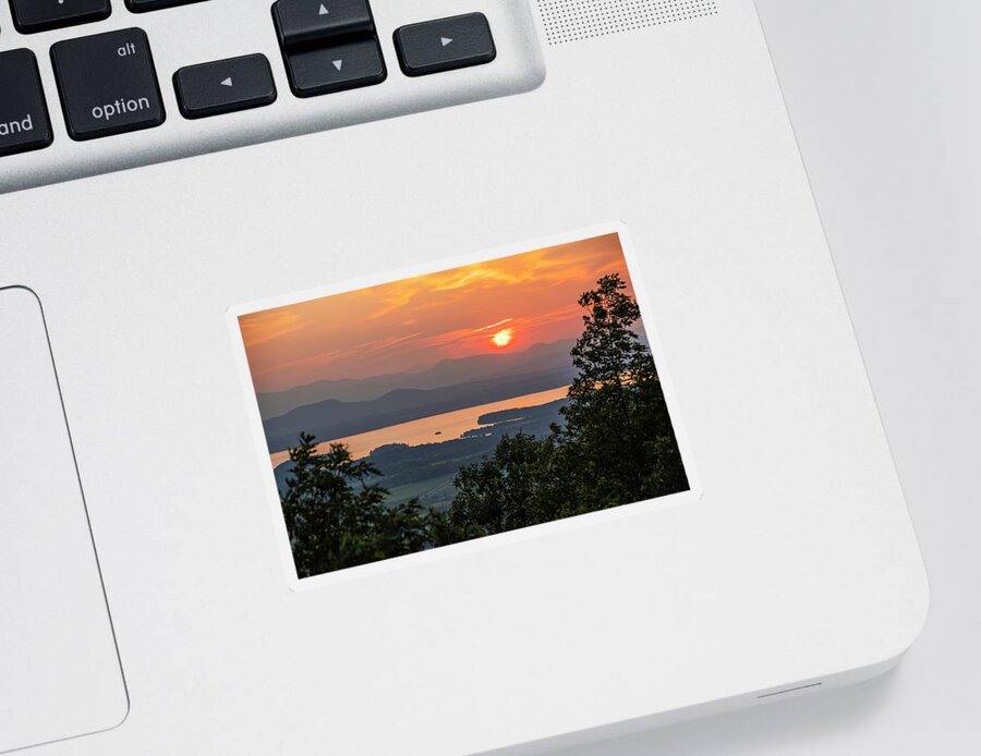 Adirondacks Sticker featuring the photograph Vibrant sunset through trees Lake Champlain and the Adirondacks from Mount Philo Charlotte Vermont by Toby McGuire