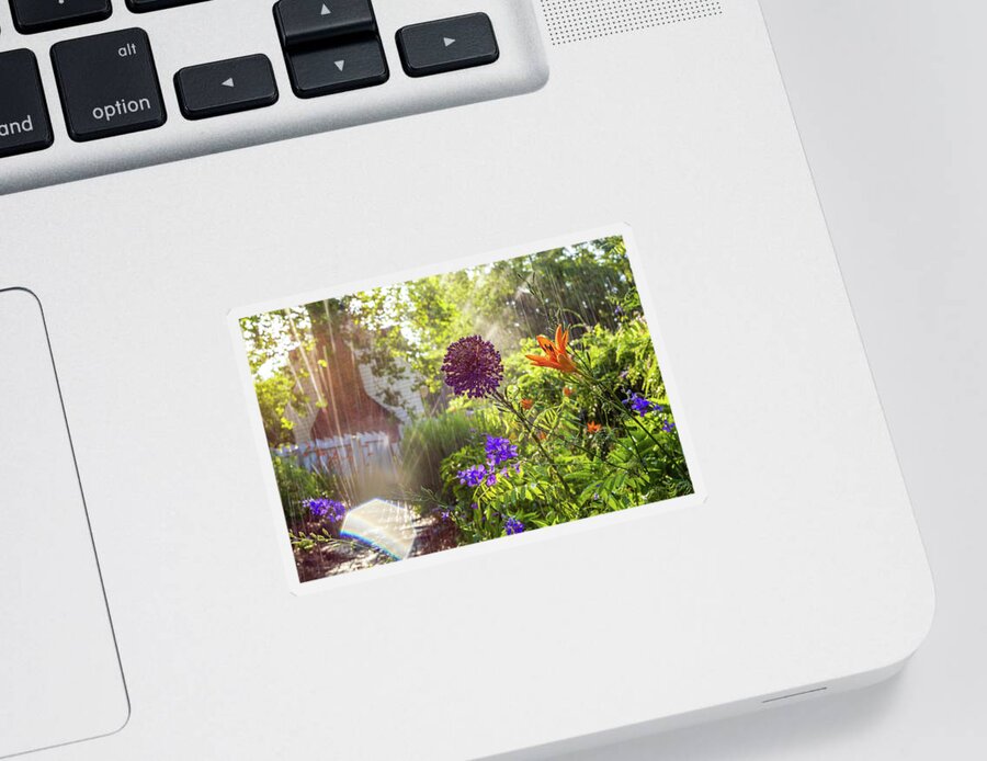 Colonial Williamsburg Sticker featuring the photograph Watering the Garden by Rachel Morrison