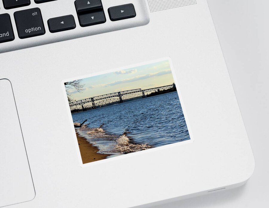River Sticker featuring the photograph Waves Lapping the Shore of the Delaware River Near Betsy Ross and Delair Memorial Railroad Bridges by Linda Stern