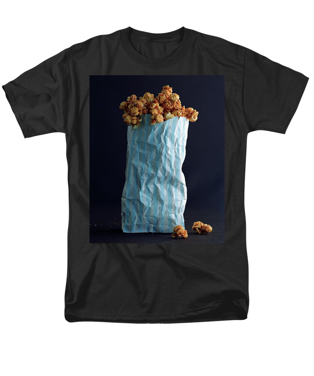 Snack Men's T-Shirt (Regular Fit) featuring the photograph A Bag Of Popcorn by Romulo Yanes