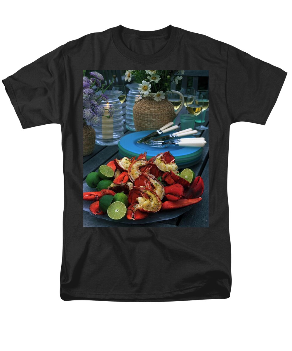 Still Life Men's T-Shirt (Regular Fit) featuring the photograph A Meal With Lobster And Limes by Romulo Yanes