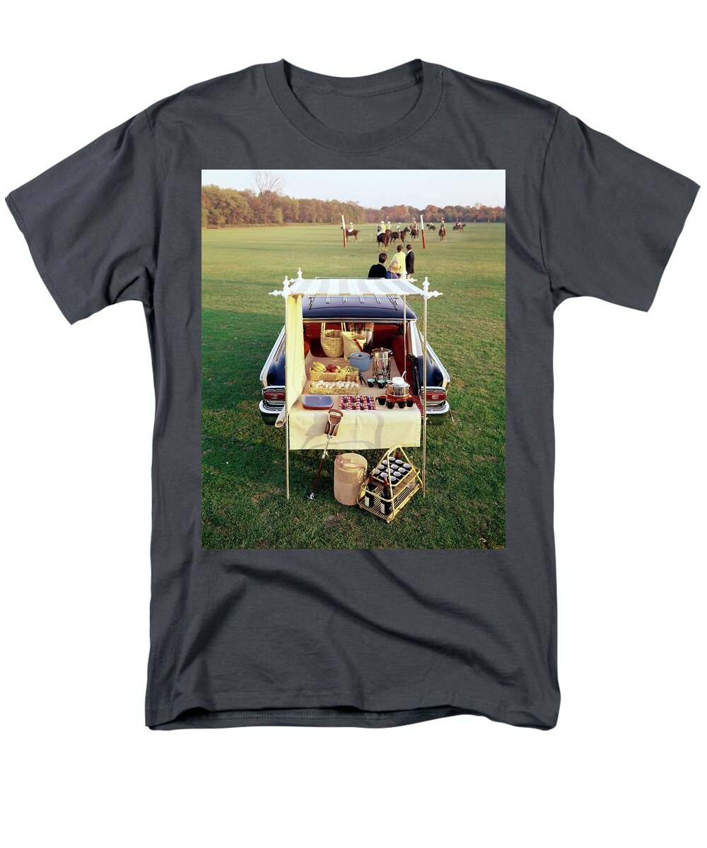 Food Men's T-Shirt (Regular Fit) featuring the photograph A Picnic Table Set Up On The Back Of A Car by Rudy Muller