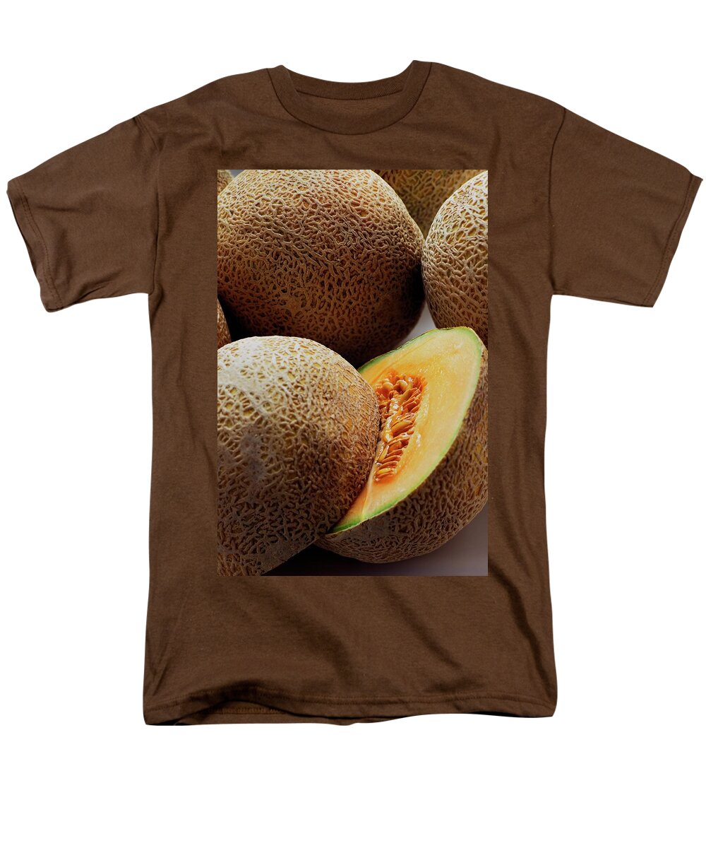 Fruits Men's T-Shirt (Regular Fit) featuring the photograph A Cantaloupe Sliced In Half by Romulo Yanes