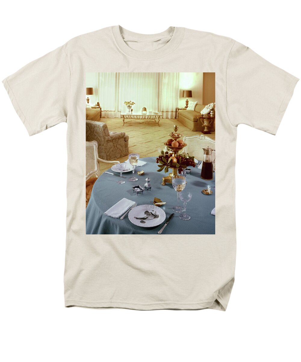 Indoors Men's T-Shirt (Regular Fit) featuring the photograph A Dining Room With A Blue Tablecloth And Ornate by Wiliam Grigsby