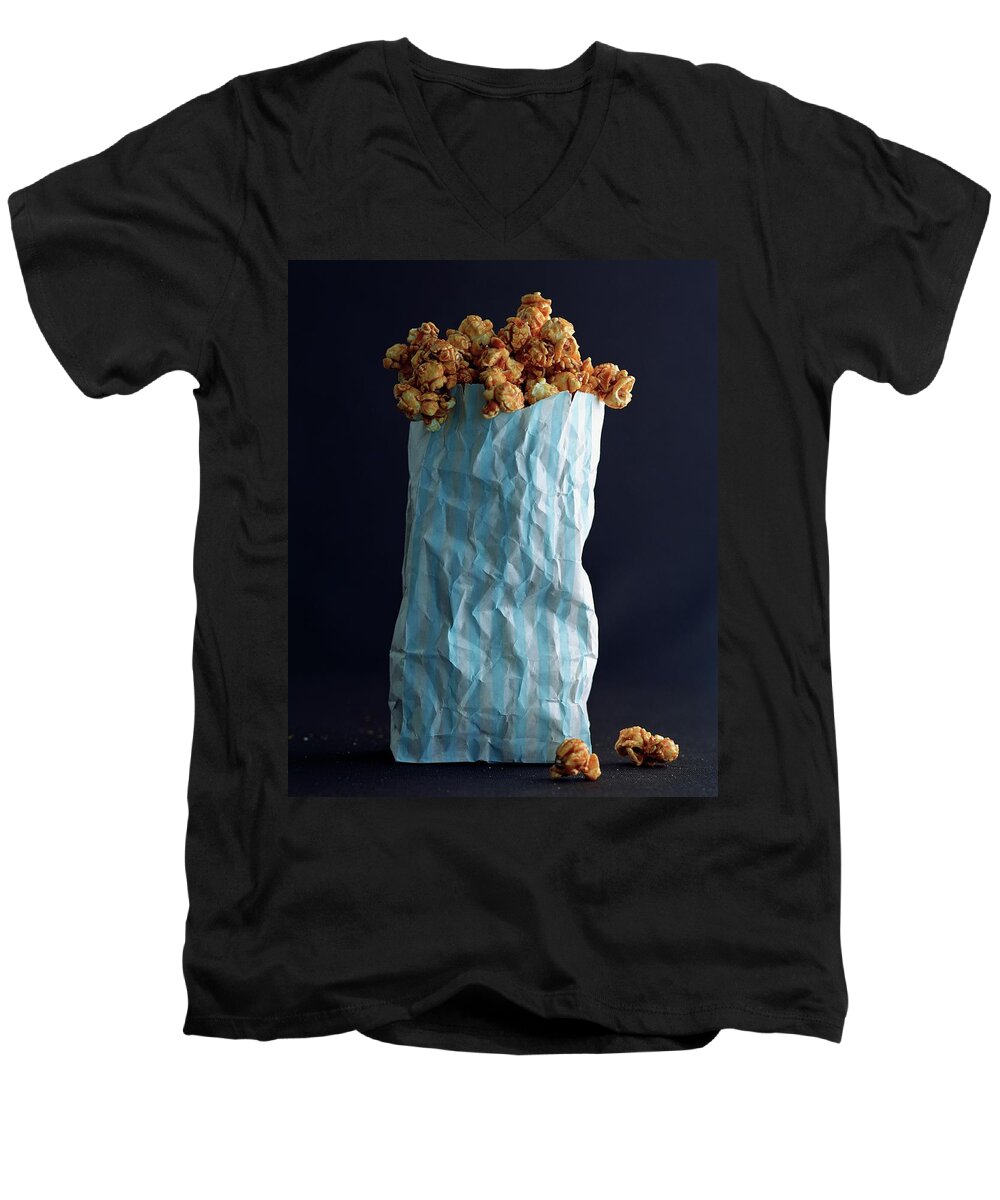 Snack Men's V-Neck T-Shirt featuring the photograph A Bag Of Popcorn by Romulo Yanes