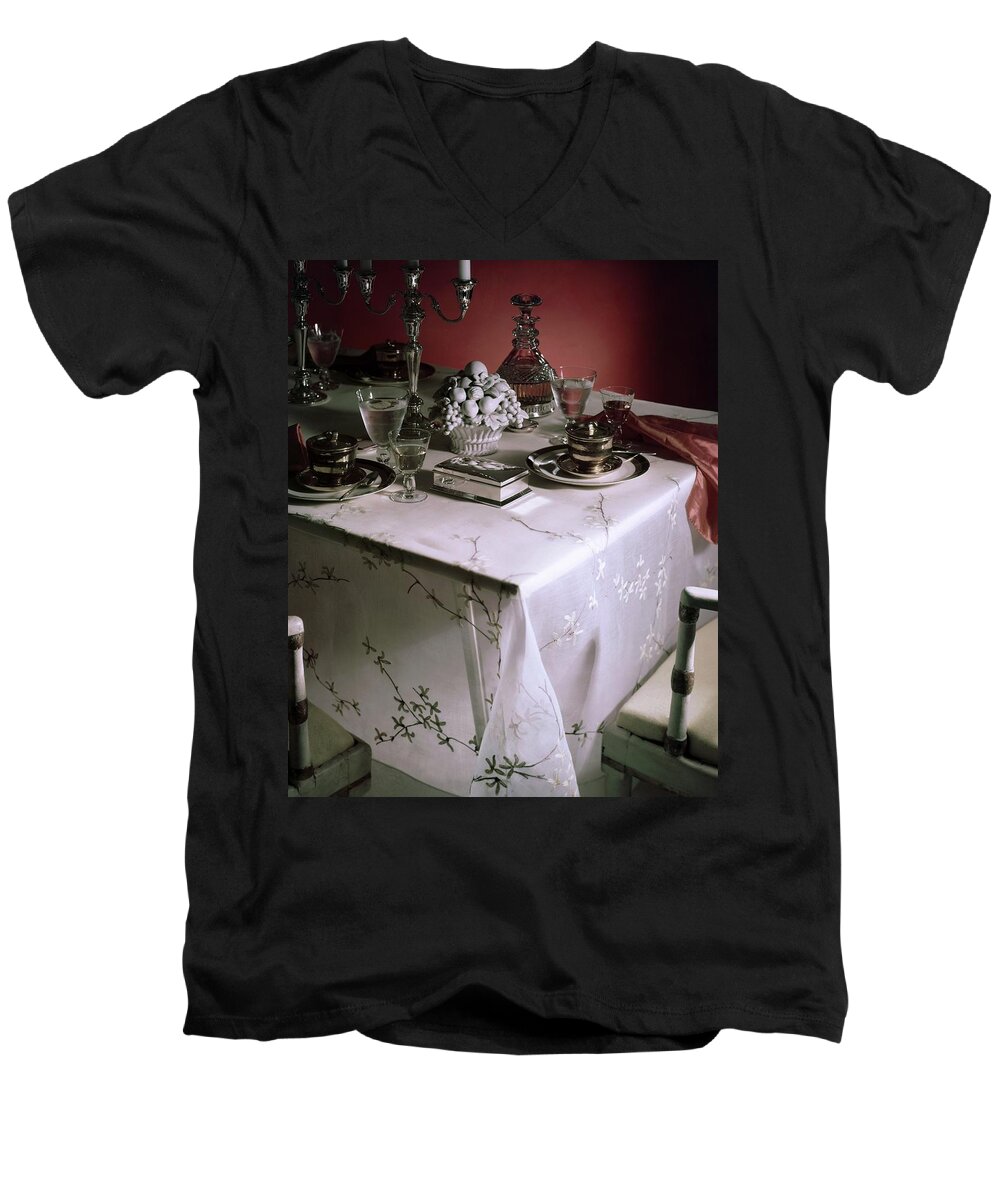 Indoors Men's V-Neck T-Shirt featuring the photograph A Table Set With Delicate Tableware by Horst P. Horst