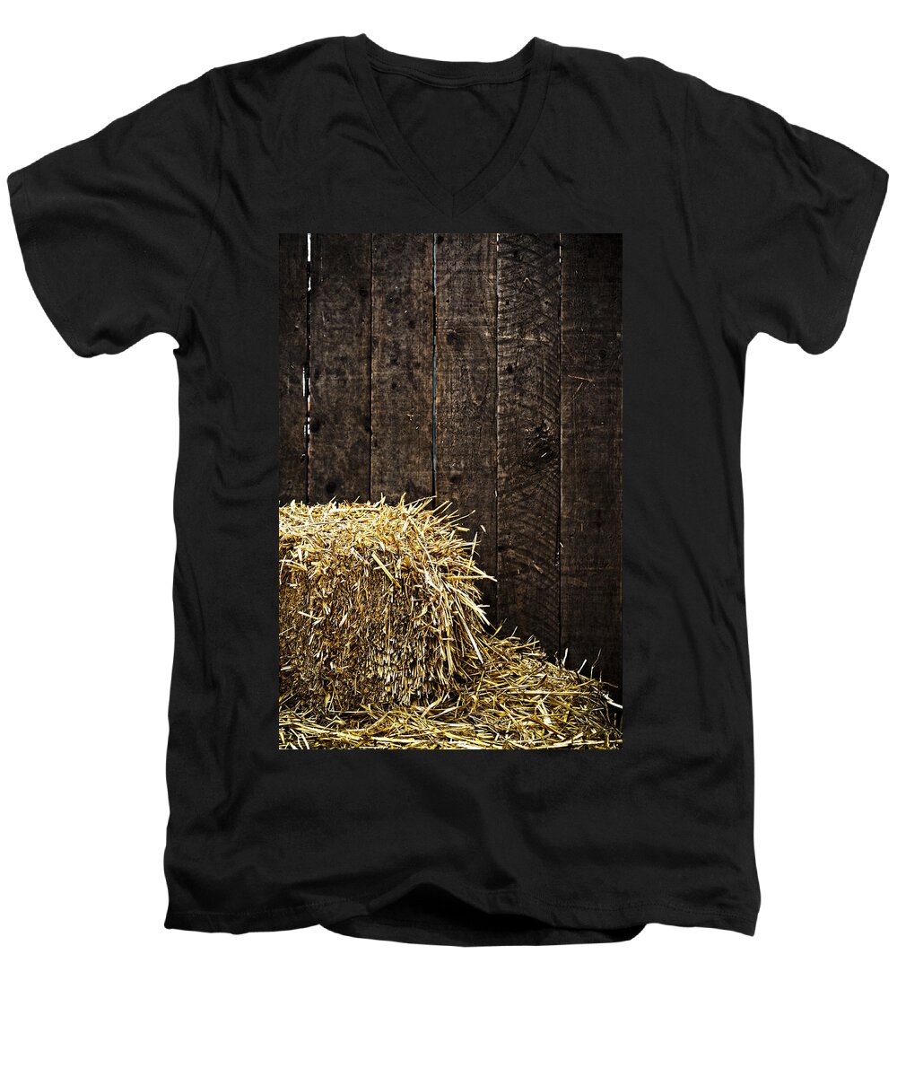 Straw Men's V-Neck T-Shirt featuring the photograph Bale of straw and wooden background by Dutourdumonde Photography