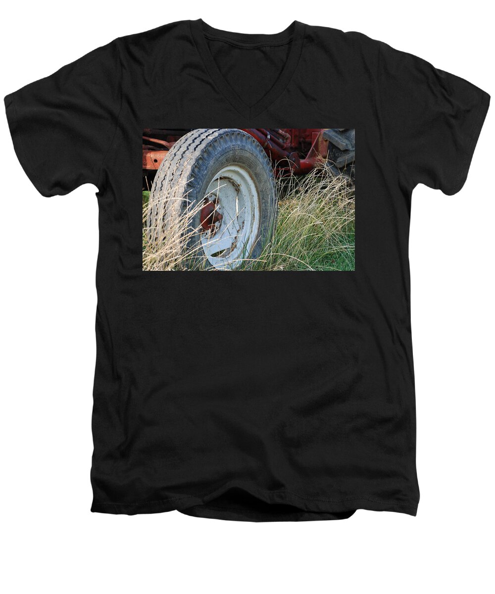 Ford Men's V-Neck T-Shirt featuring the photograph Ford Tractor Tire by Jennifer Ancker