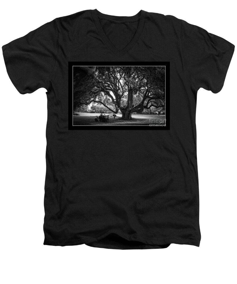 Gnarly Tree Men's V-Neck T-Shirt featuring the photograph Gnarly Tree with Plow by Imagery by Charly