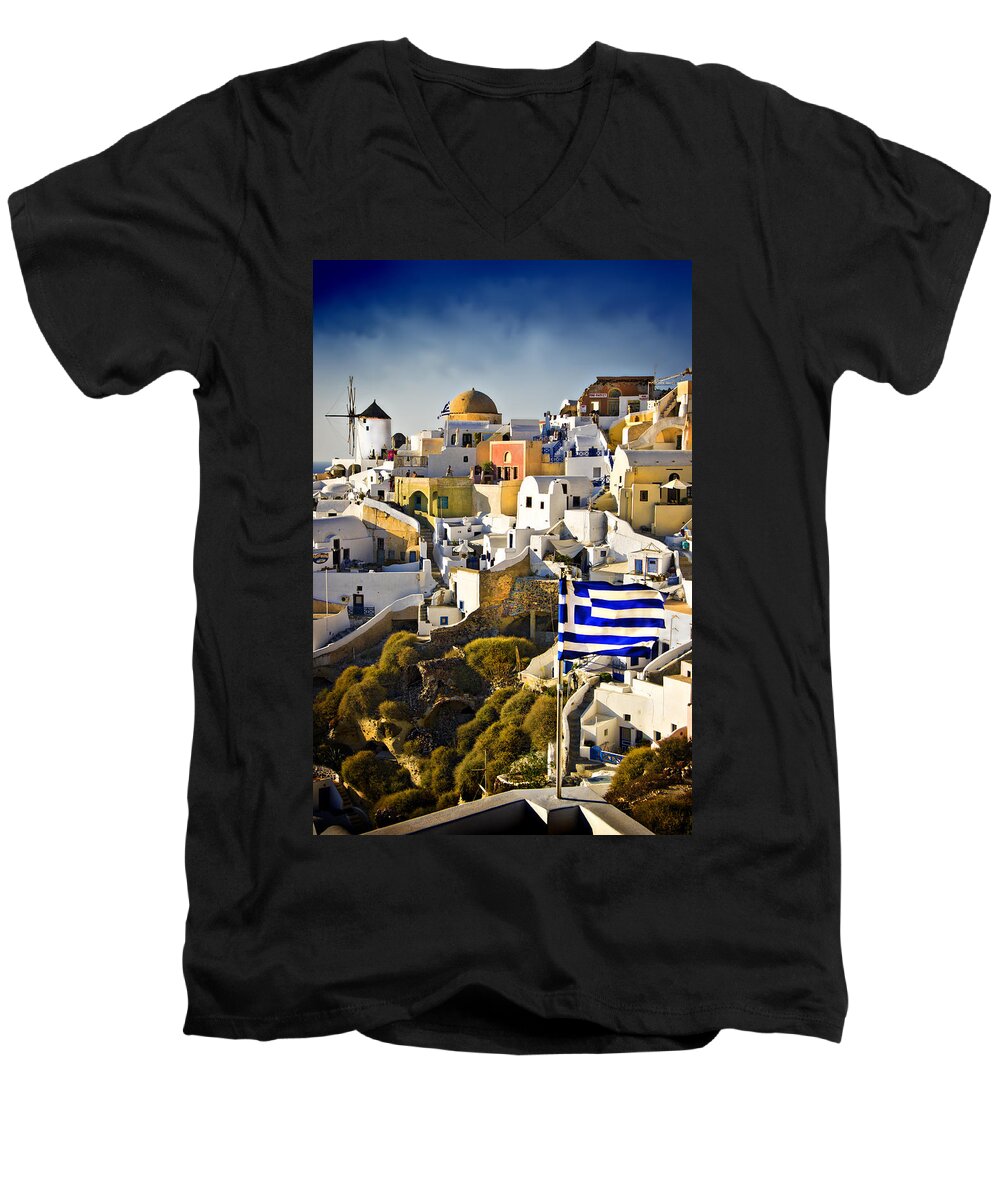 Santorini Men's V-Neck T-Shirt featuring the photograph Oia and a greek flag by Meirion Matthias