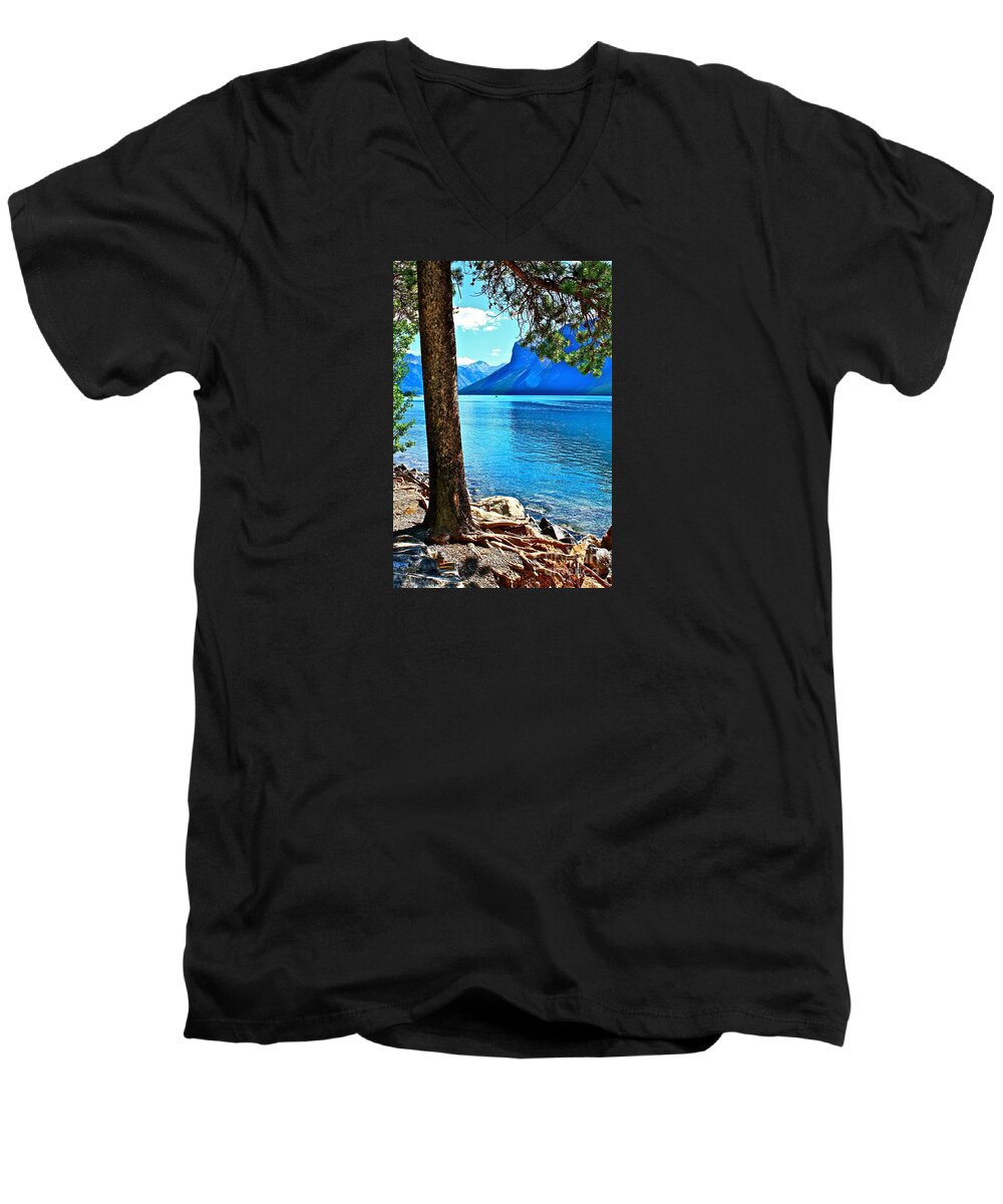 Lake Men's V-Neck T-Shirt featuring the photograph Rooted in Lake Minnewanka by Linda Bianic