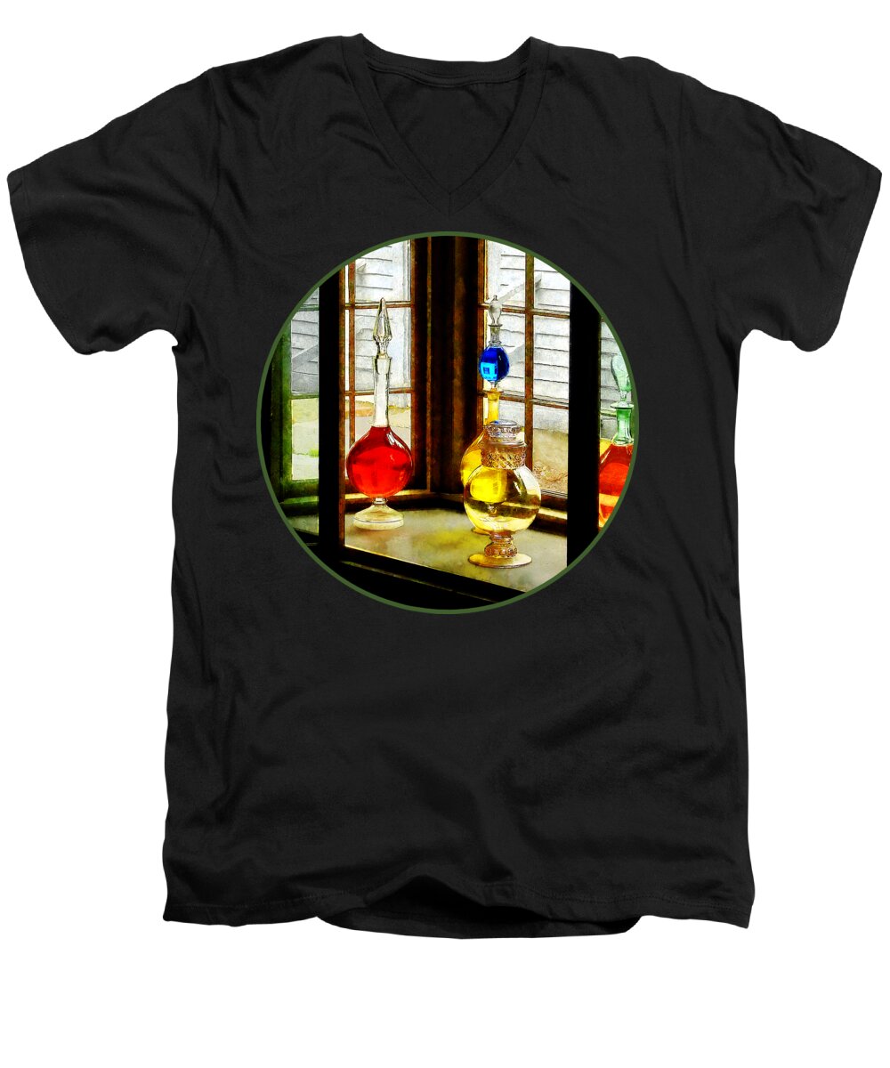 Pharmacies Men's V-Neck T-Shirt featuring the photograph Pharmacist - Colorful Bottles in Drug Store Window by Susan Savad