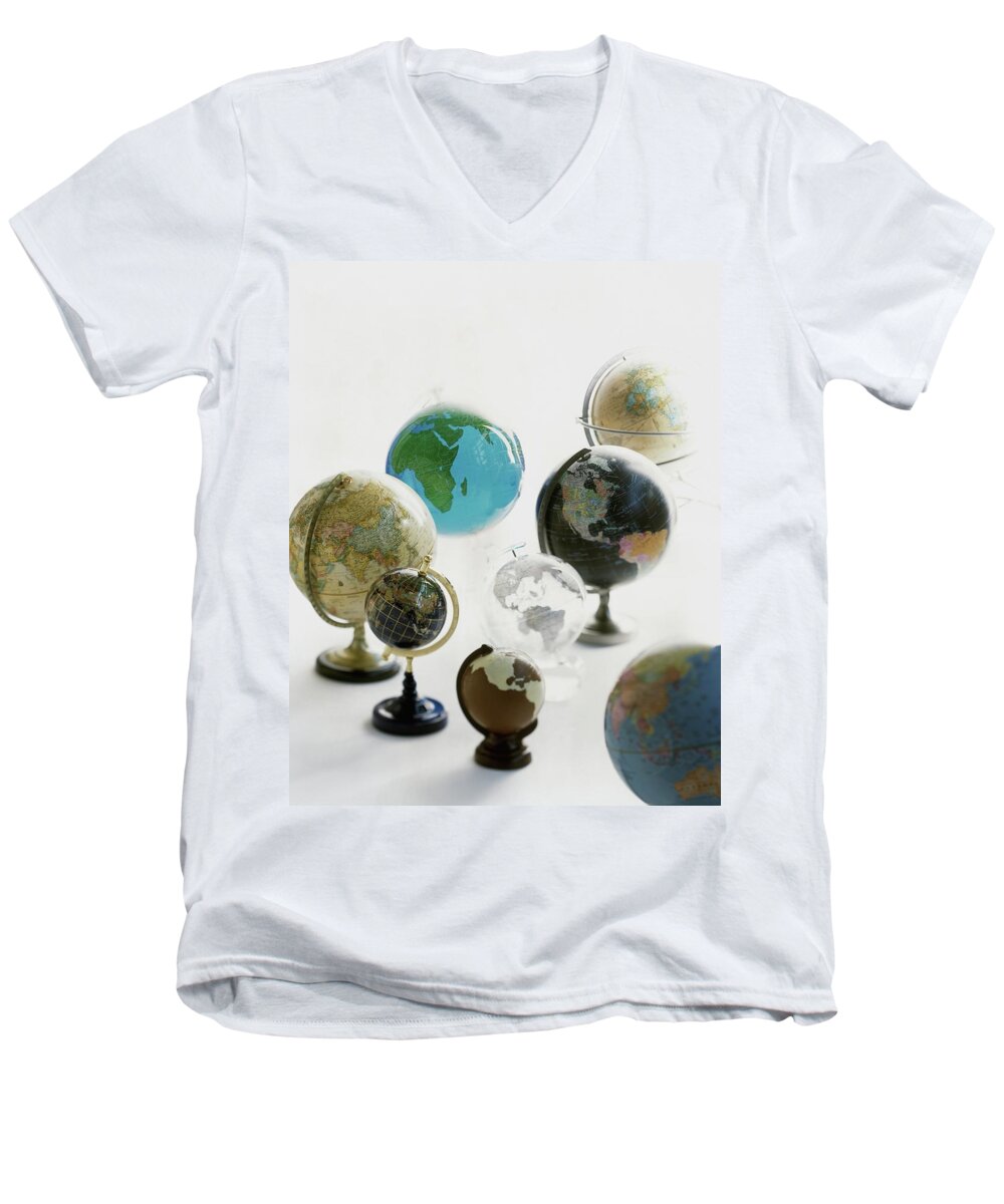 Home Men's V-Neck T-Shirt featuring the photograph A Collection Of Globes by Romulo Yanes