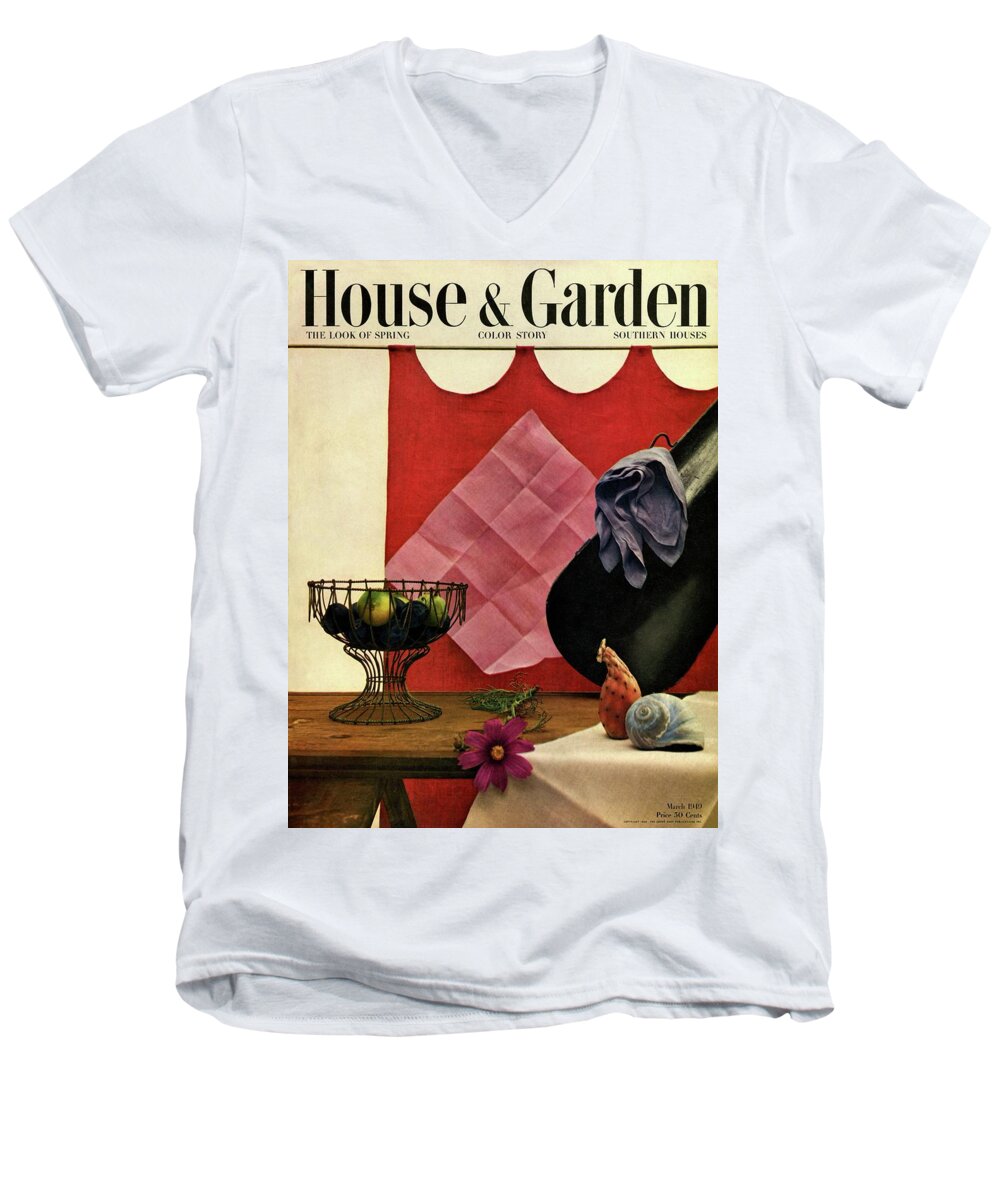 House And Garden Men's V-Neck T-Shirt featuring the photograph A Wire Basket On A Wooden Table by John Rawlings