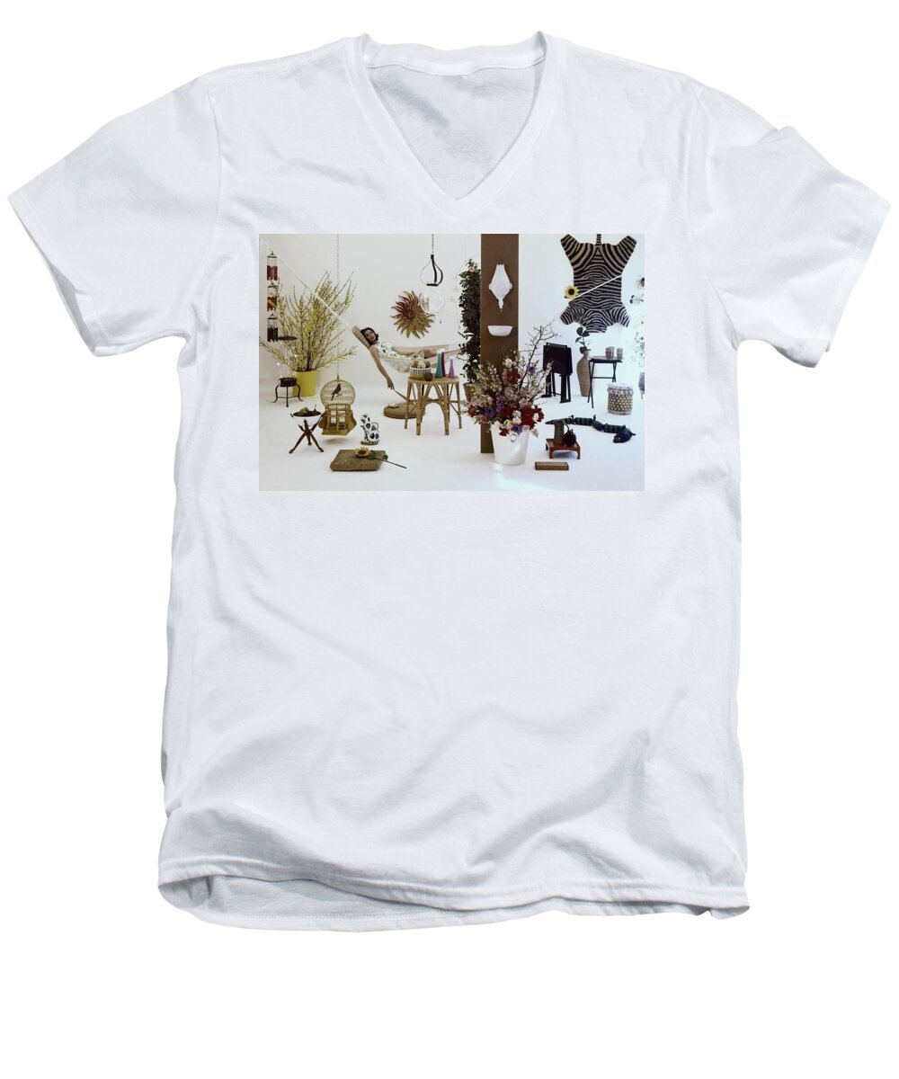 Indoors Men's V-Neck T-Shirt featuring the photograph A Woman In A Hammock And Porch Furniture by Tom Yee
