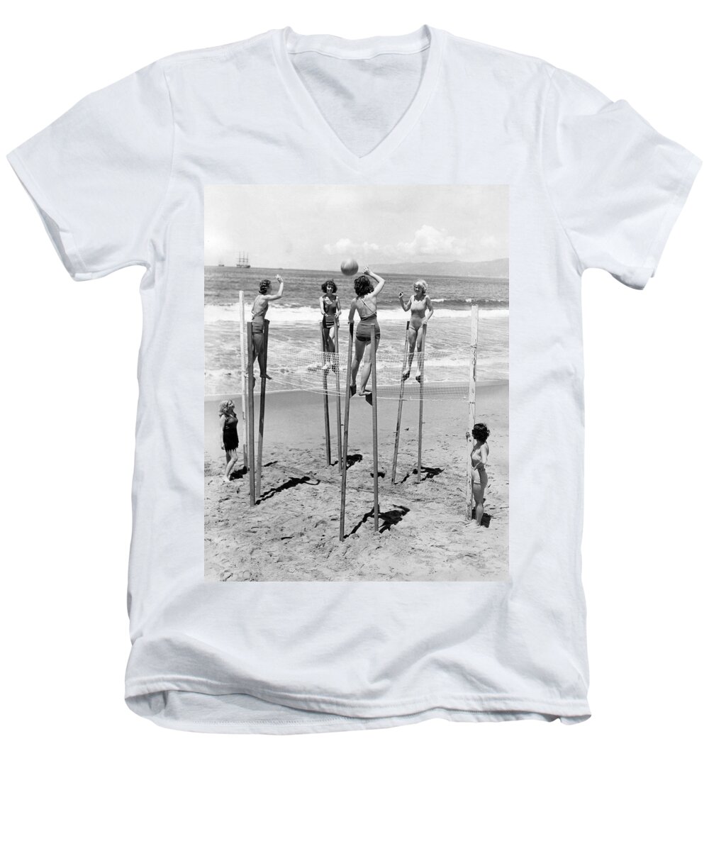 1930's Men's V-Neck T-Shirt featuring the photograph Volleyball On Stilts by Underwood Archives