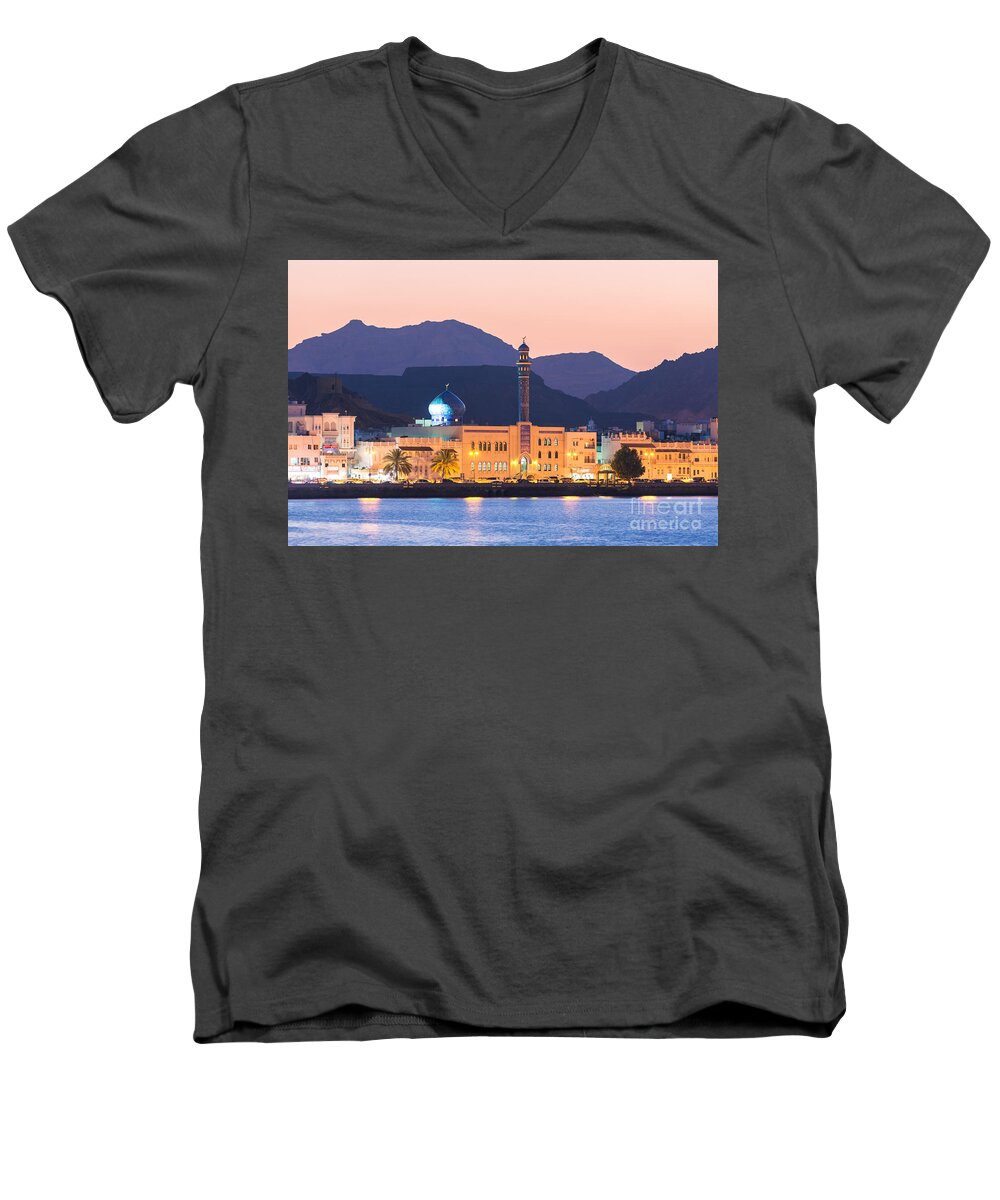 Oman Men's V-Neck T-Shirt featuring the photograph Oman - Muscat - Mutrah harbour and old town at dusk by Matteo Colombo