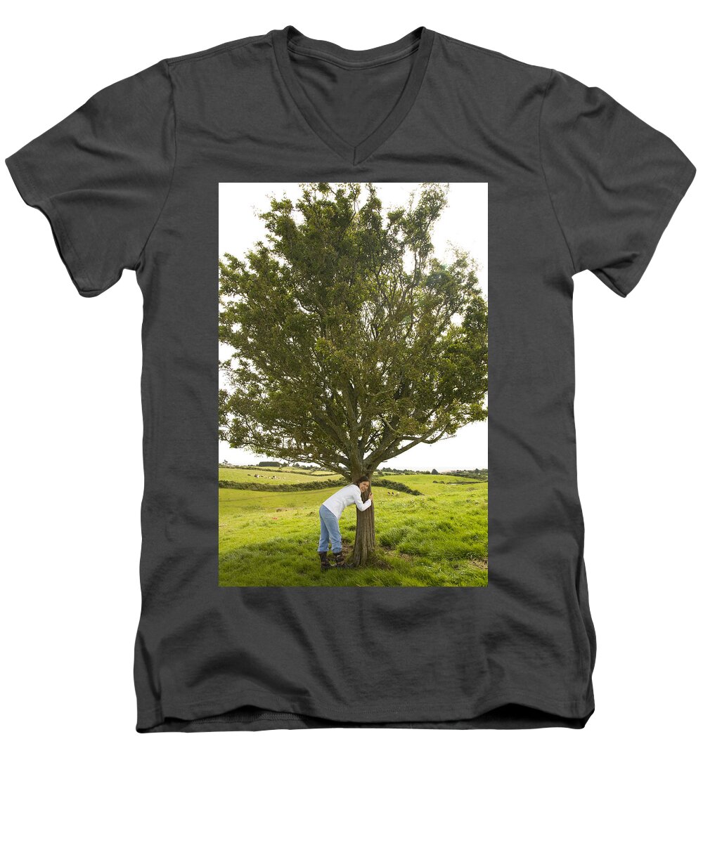 Green Men's V-Neck T-Shirt featuring the photograph Hugging the fairy tree in Ireland by Ian Middleton