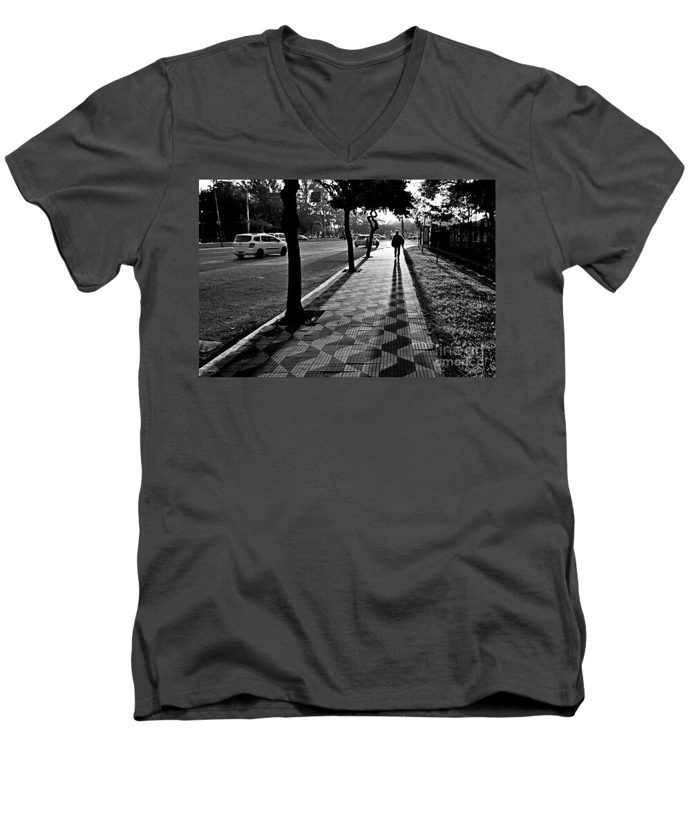 Sidewalk Men's V-Neck T-Shirt featuring the photograph Lonely Man Walking at Dusk in Sao Paulo by Carlos Alkmin