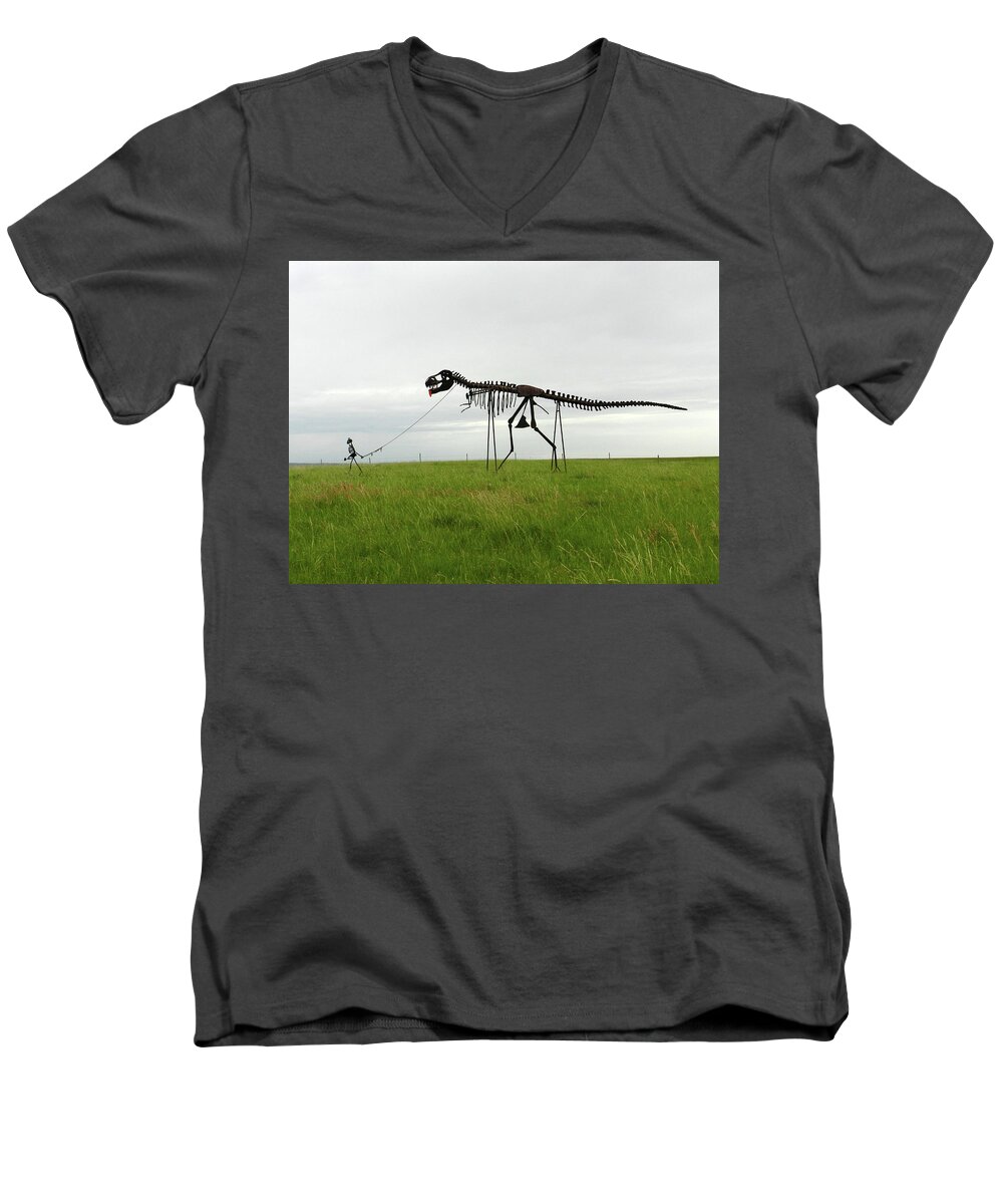 Tyrannosaurus Rex Men's V-Neck T-Shirt featuring the photograph Skeletal man walking his dinosaur statue by Breck Bartholomew