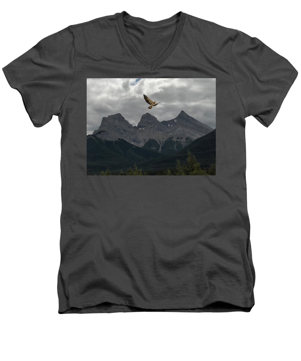 Hawk Mountains Trees Woods Banff Alberta Wild Bird Hunter Flying Three Sisters Men's V-Neck T-Shirt featuring the photograph The Calling by Andrea Lawrence