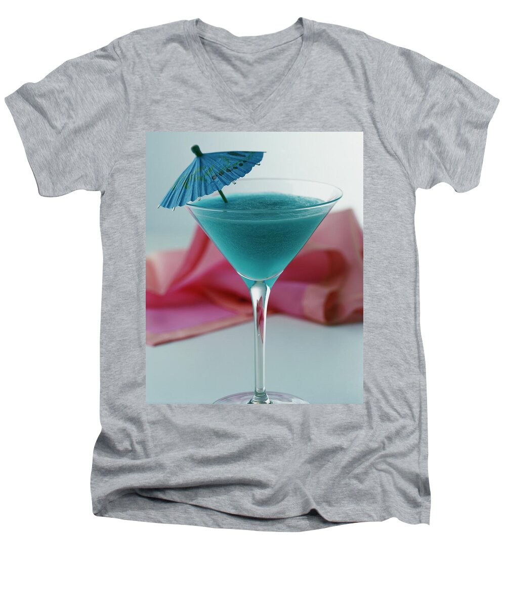 Beverage Men's V-Neck T-Shirt featuring the photograph A Blue Hawaiian Cocktail by Romulo Yanes
