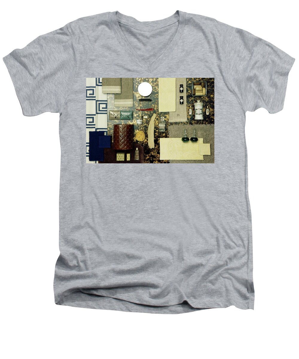 Studio Shot Men's V-Neck T-Shirt featuring the photograph A Group Of Household Items by Geoffrey Baker