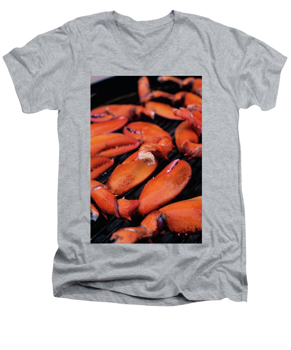 Cooking Men's V-Neck T-Shirt featuring the photograph A Group Of Lobster Claws On A Grill by Romulo Yanes