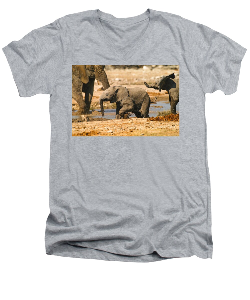 A Baby Elephants Play Men's V-Neck T-Shirt featuring the photograph Chase you by Alistair Lyne
