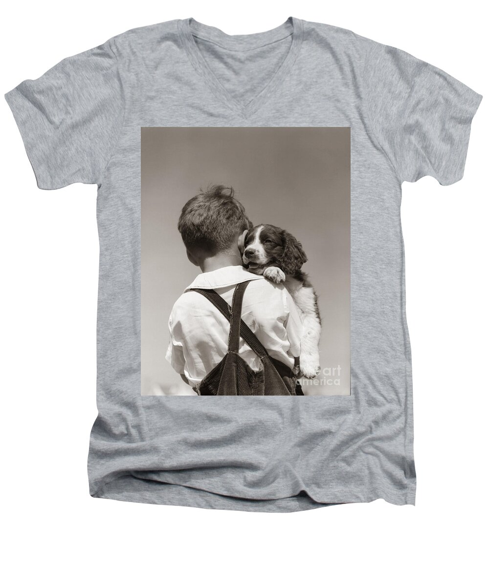 1930s Men's V-Neck T-Shirt featuring the photograph Boy With Puppy, C.1930-40s by H Armstrong Roberts ClassicStock