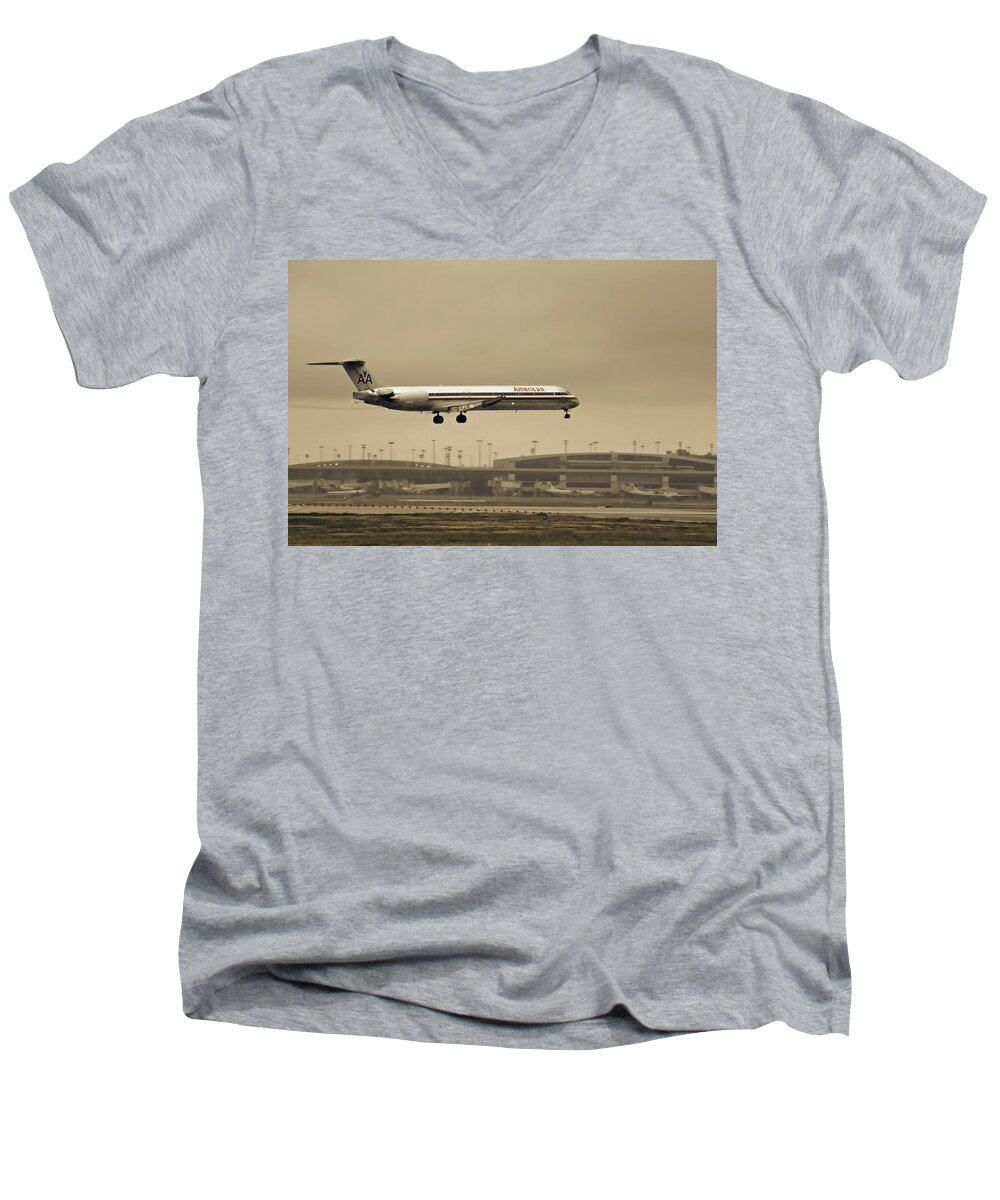 American Airlines-the Mcdonnell Douglas Md-81/82/83/88 Men's V-Neck T-Shirt featuring the photograph Landing at DFW Airport by Douglas Barnard