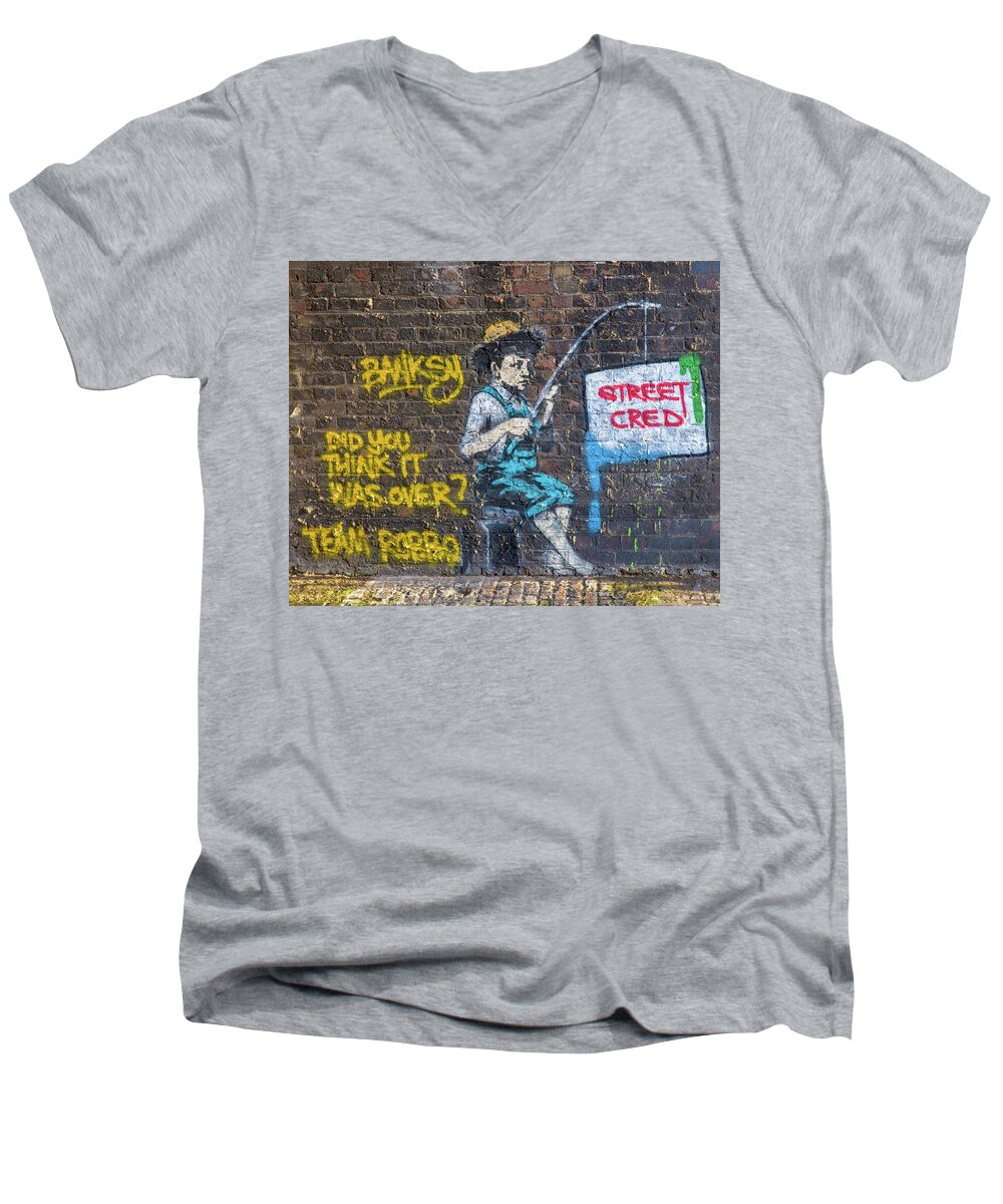 Banksy Men's V-Neck T-Shirt featuring the photograph Banksy Boy Fishing Street Cred by Gigi Ebert