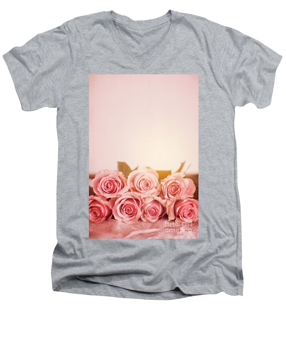 Pink Rose Men's V-Neck T-Shirt featuring the photograph Seven Pink Roses With A Plain Pink Background by Ethiriel Photography