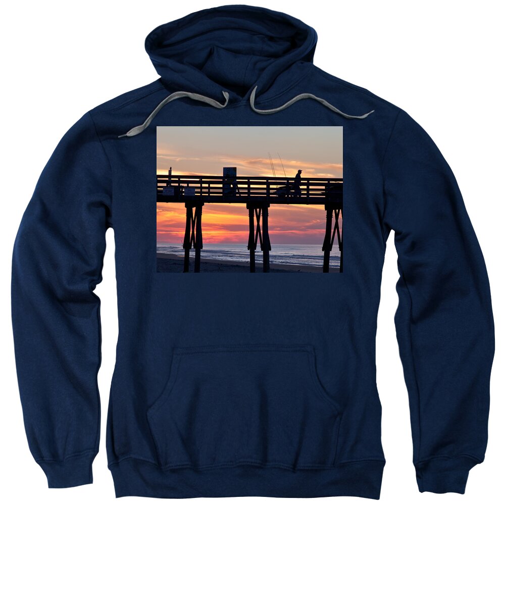Fishing Sweatshirt featuring the photograph Silhouetted Fisherman On Ocean Pier At Sunrise by Jo Ann Tomaselli