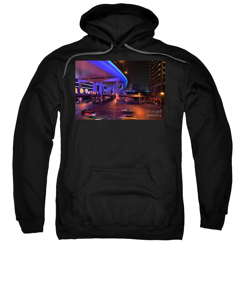 Cars Sweatshirt featuring the photograph Colorful night traffic scene in Shanghai China by Imran Ahmed
