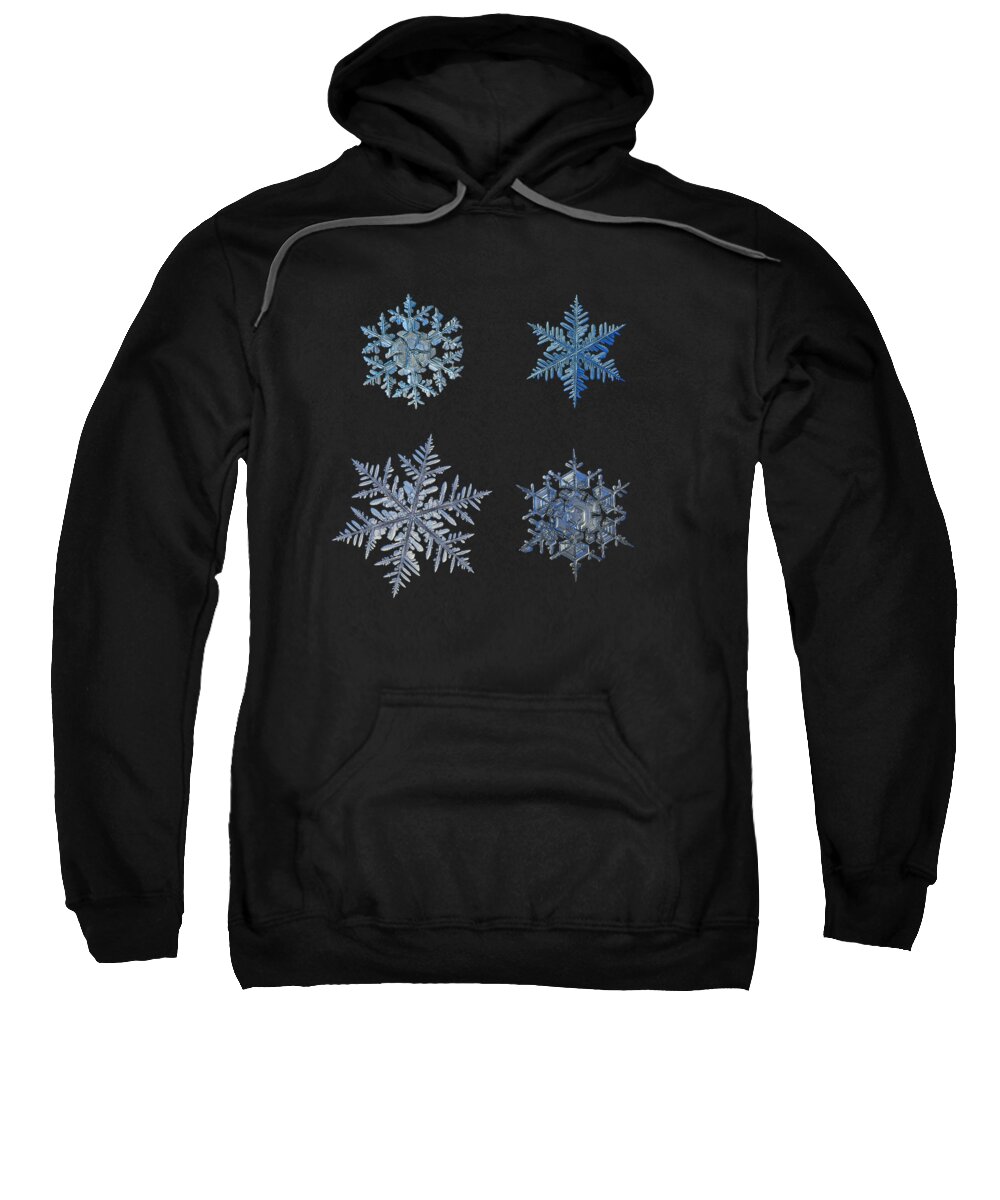 Snowflake Sweatshirt featuring the photograph Four snowflakes on black background by Alexey Kljatov