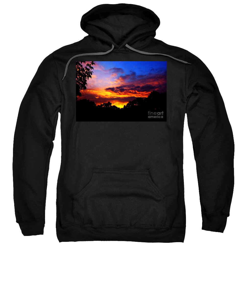 Clay Sweatshirt featuring the photograph Ominous Sunset by Clayton Bruster