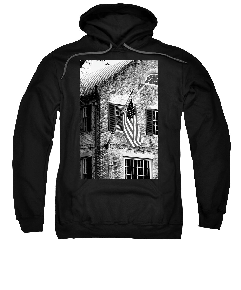 Colonial Sweatshirt featuring the photograph US Flag in Colonial Williamsbug by Emanuel Tanjala