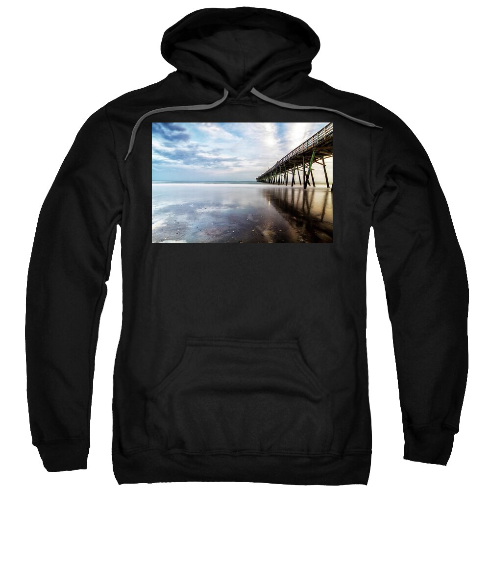 North Carolina Fishing Pier Sweatshirt featuring the photograph Oceanna Pier With Blue Skies and Dark Clouds Reflected by Bob Decker