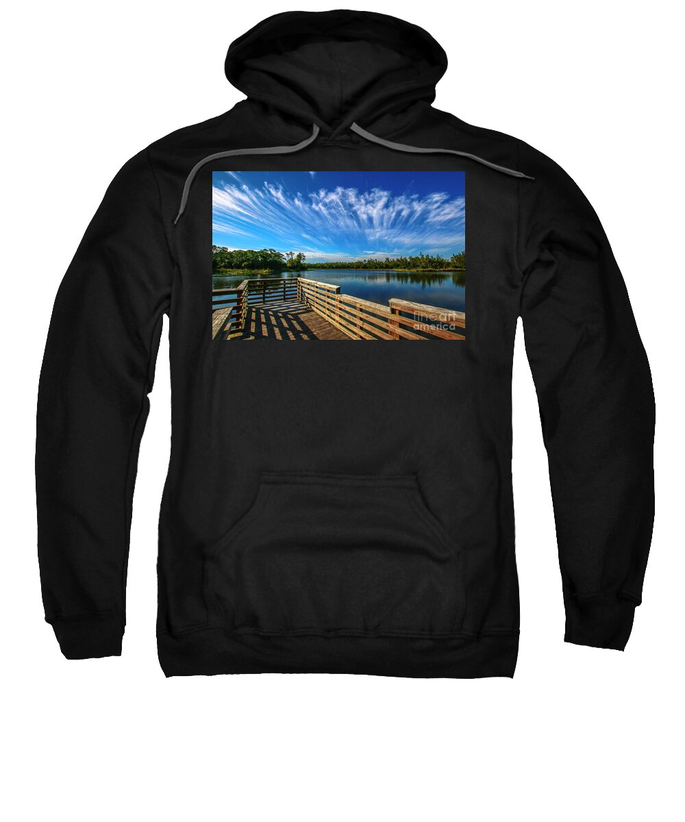 Deck Sweatshirt featuring the photograph Streaking Clouds by Tom Claud