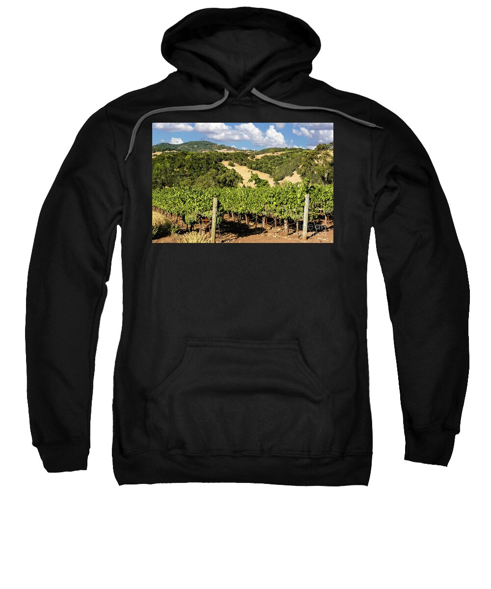 Clouds Sweatshirt featuring the photograph White puffy clouds over the Napa Valley hills full of wine grapes and lines and lines of vineyards. by Gunther Allen