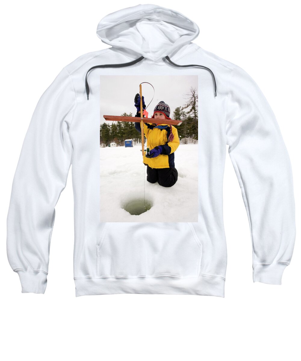 A Boy Checks Traps, While Ice Fishing #2 Adult Pull-Over Hoodie by