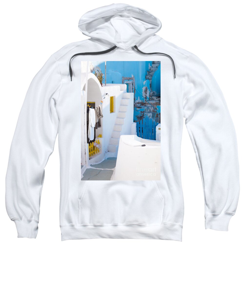 Glimpse Sweatshirt featuring the photograph Glimpse of typical white houses in Oia Santorini Greece #2 by Matteo Colombo