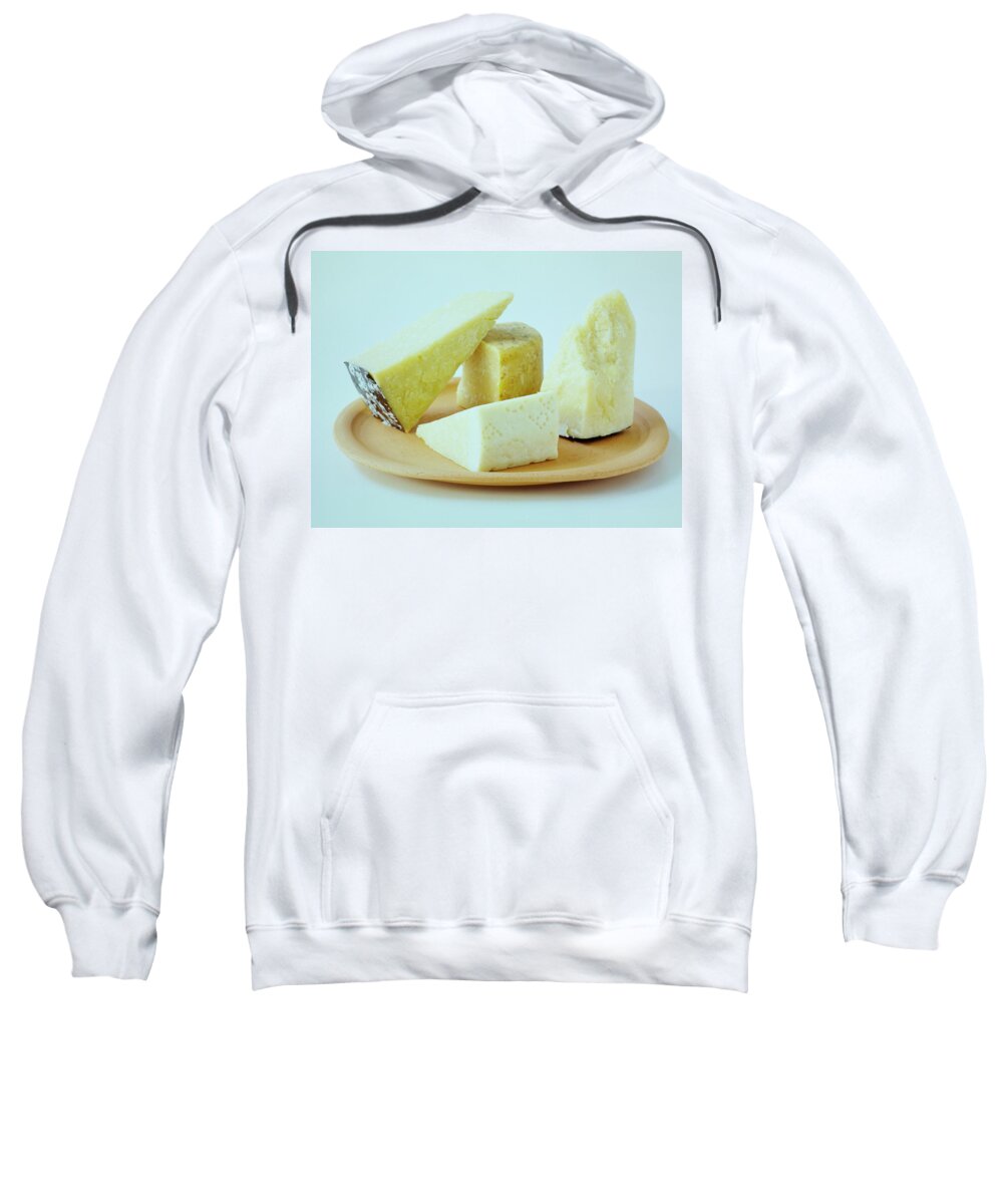 Dairy Sweatshirt featuring the photograph A Variety Of Cheese On A Plate by Romulo Yanes