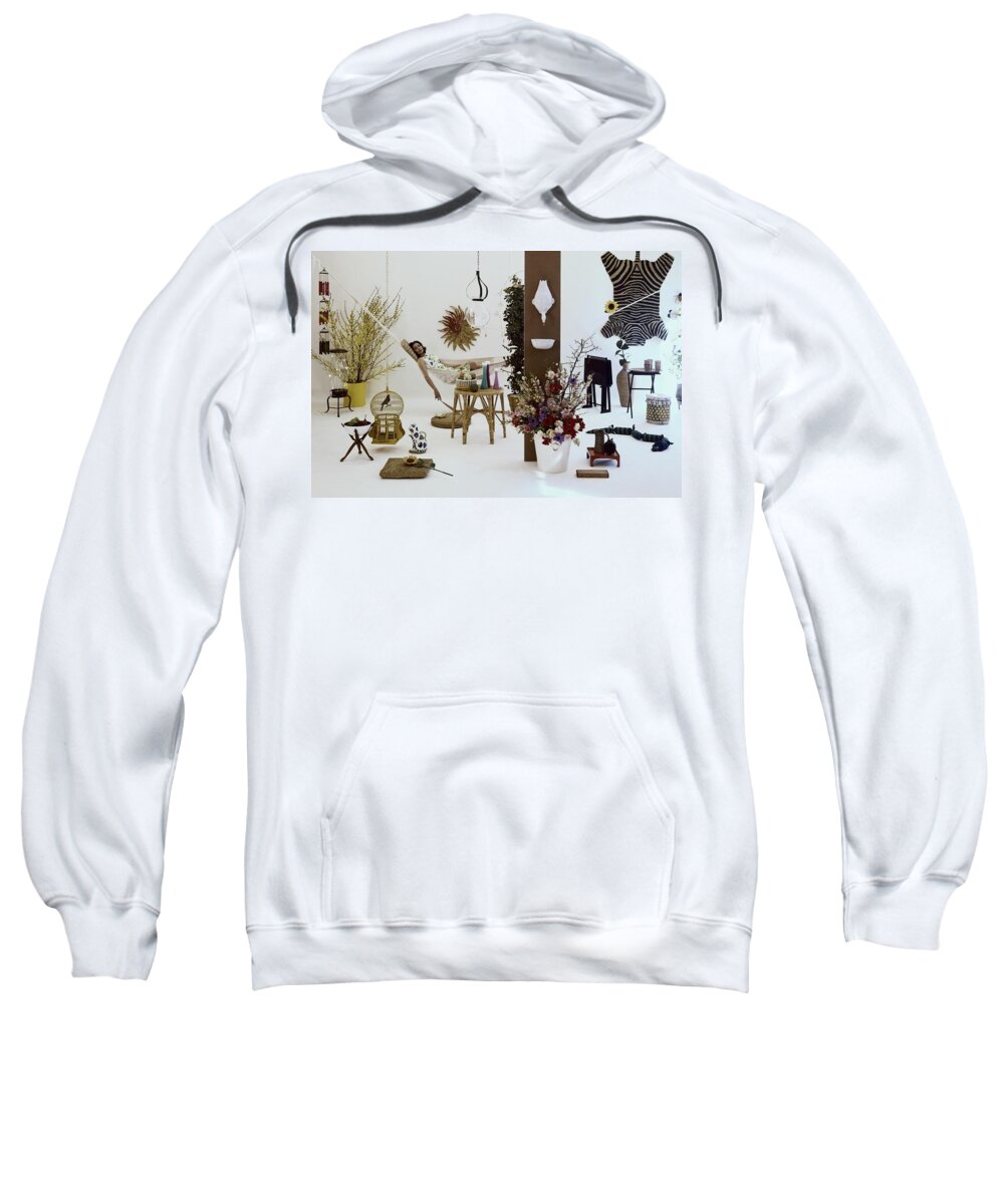 Indoors Sweatshirt featuring the photograph A Woman In A Hammock And Porch Furniture by Tom Yee