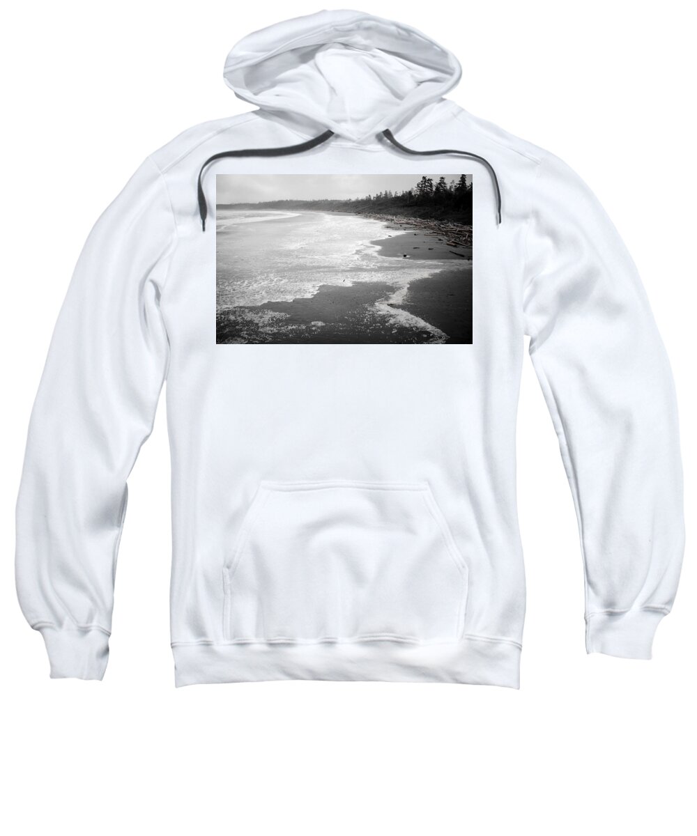 Driftwood Along Shoreline Sweatshirt featuring the photograph Winter at Wickaninnish Beach by Roxy Hurtubise