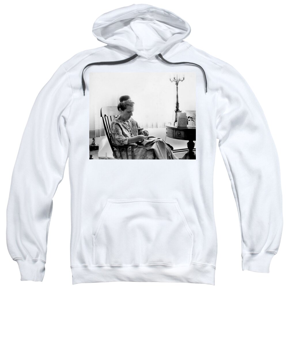 Woman Sweatshirt featuring the photograph Mending More Than Clothes by Rory Siegel