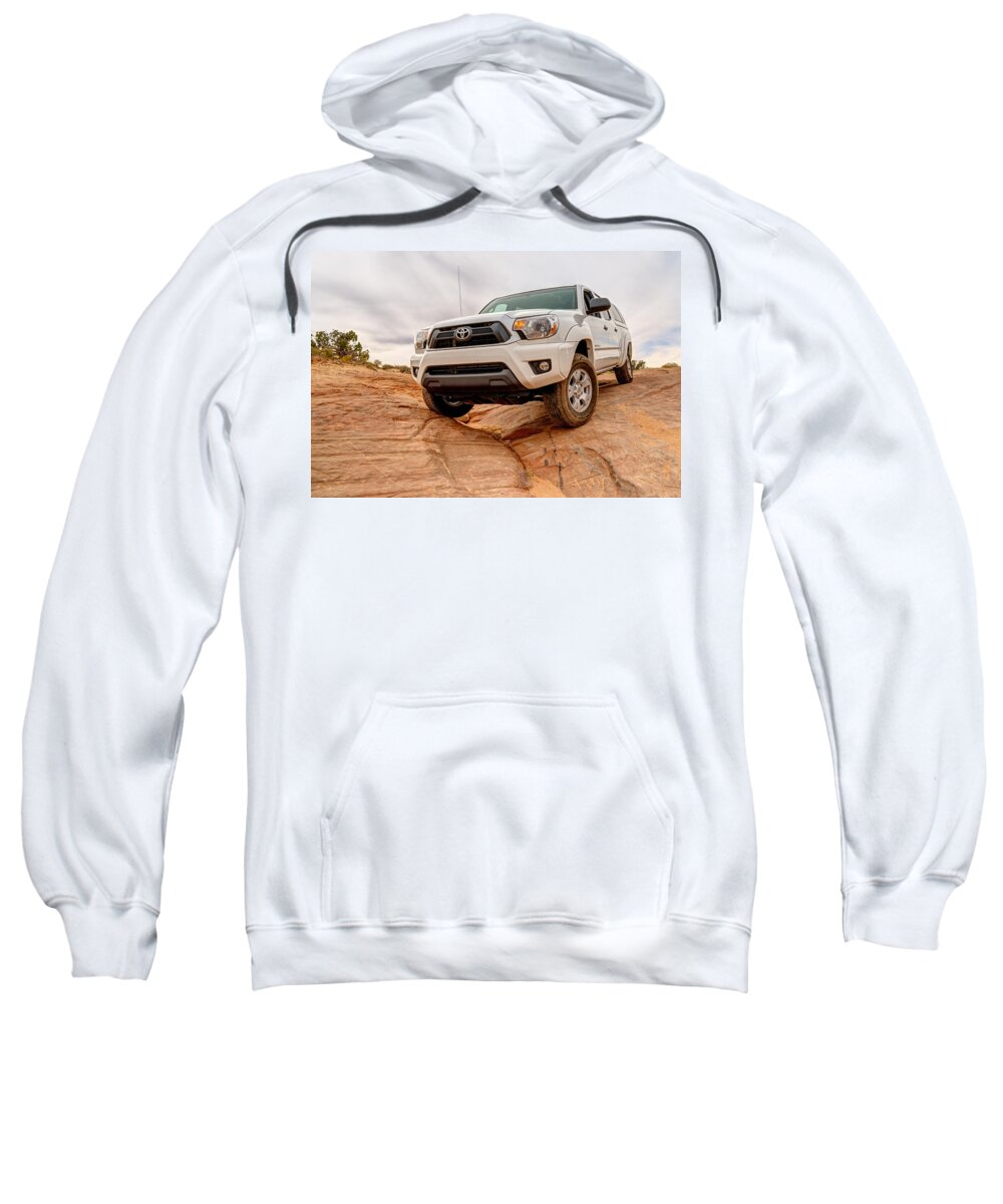 4 Wheel Drive Sweatshirt featuring the photograph Toyota Tacoma at Arches #1 by Brett Engle