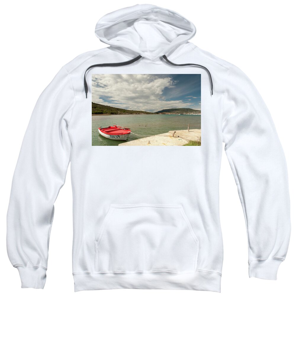 Red Sweatshirt featuring the photograph Small red boat in a bay in cres by Stefan Rotter
