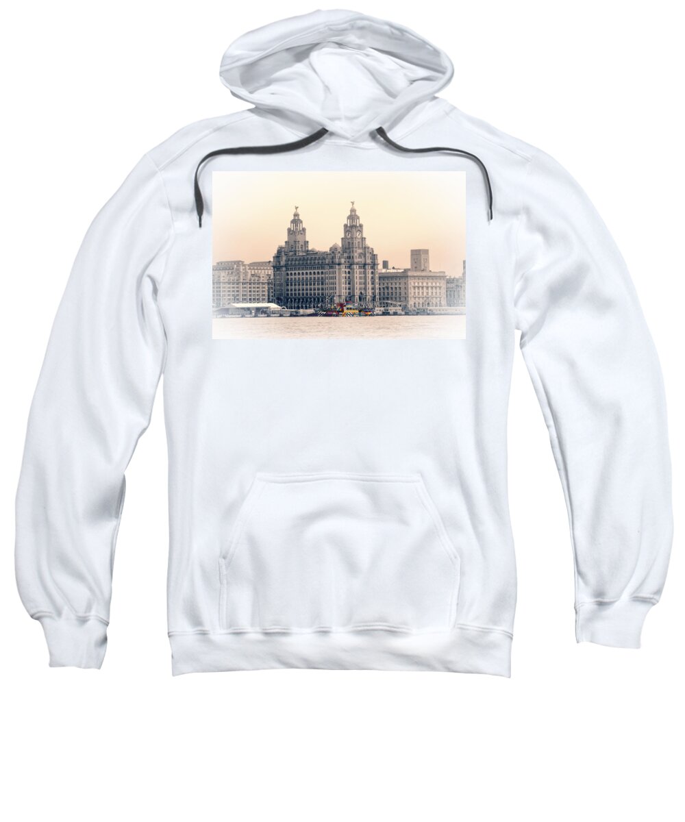 Pier Sweatshirt featuring the photograph Snowdrop Dazzles in front of the Liverbirds by Spikey Mouse Photography